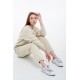 Модний жіночий спортивний костюм Бежевий Модний жіночий спортивний костюм Бежевий